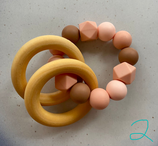 Silicon and wooden teether
